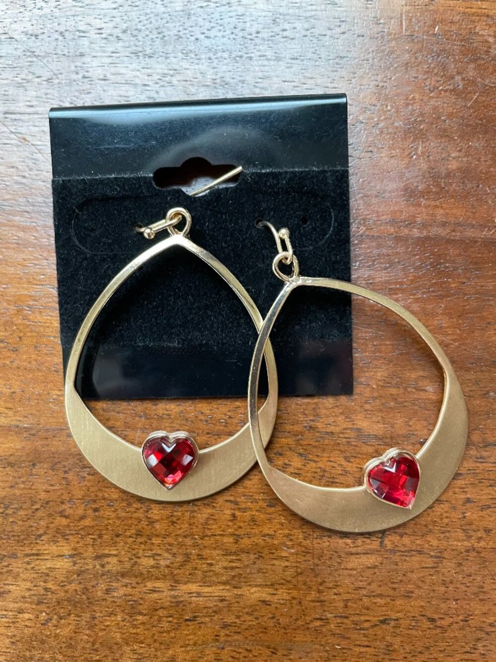 Bundle 3/$12.  Gold Tone Dangle Earrings with Red Faceted Heart Stone
